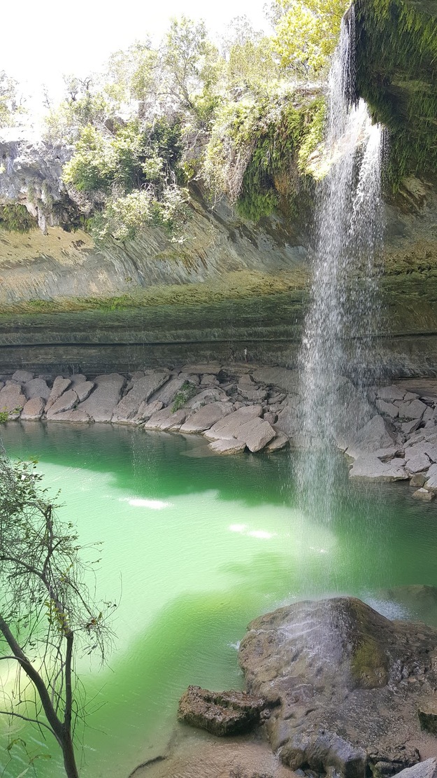 Emerald water and waterfall