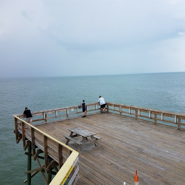 People standing on the pier