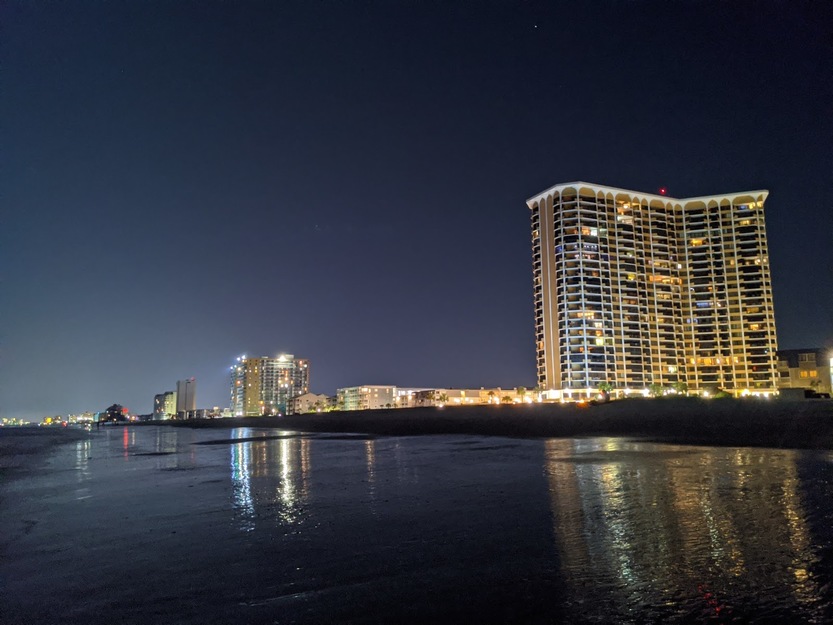 Night view of the skyscrapers on the seashore