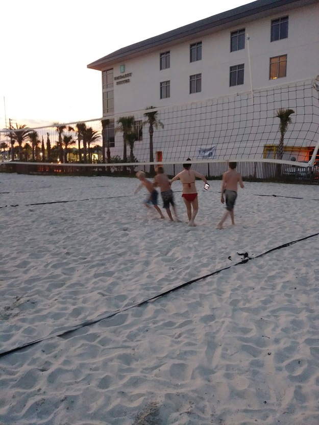 People playing beach volleyball on St. Augustine Beach