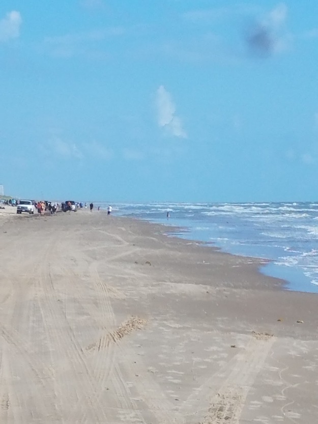People and cars on Boca Chica Beach