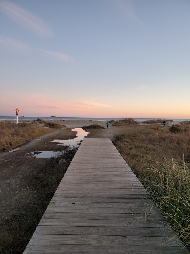 Wooden boardwalk leading to the beach