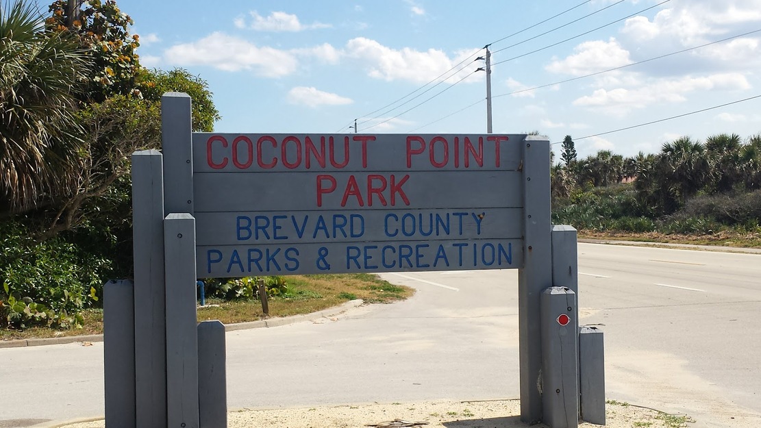 Coconut Point Park entrance shield
