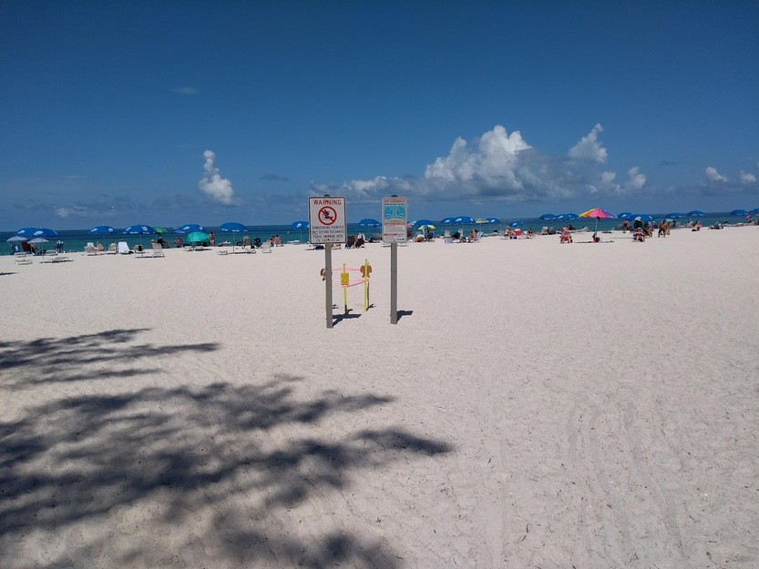 Warning shields on the beach