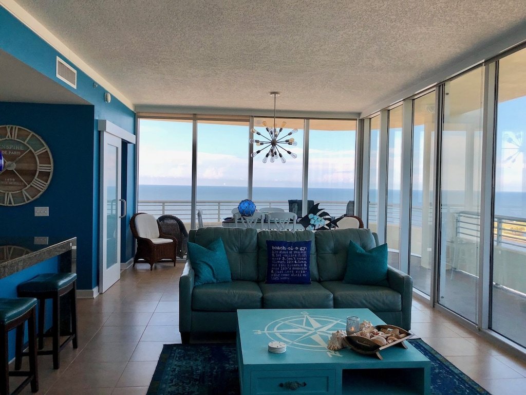 Floor To Ceiling Windows Overlook The Gulf Of Mexico's Pristine White Beaches photo