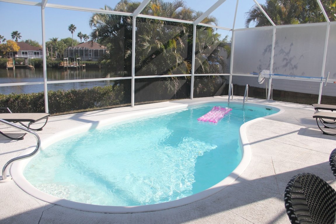 Beautiful Waterfront View! Spacious 4 Bedroom Home with Private Heated Pool photo