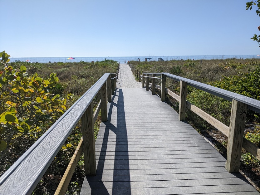 Wooden boardwalk leading to Gulfside City Park Beach