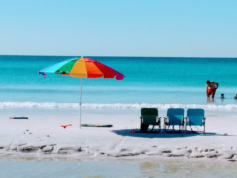 Umbrella and sunbeds on the beach