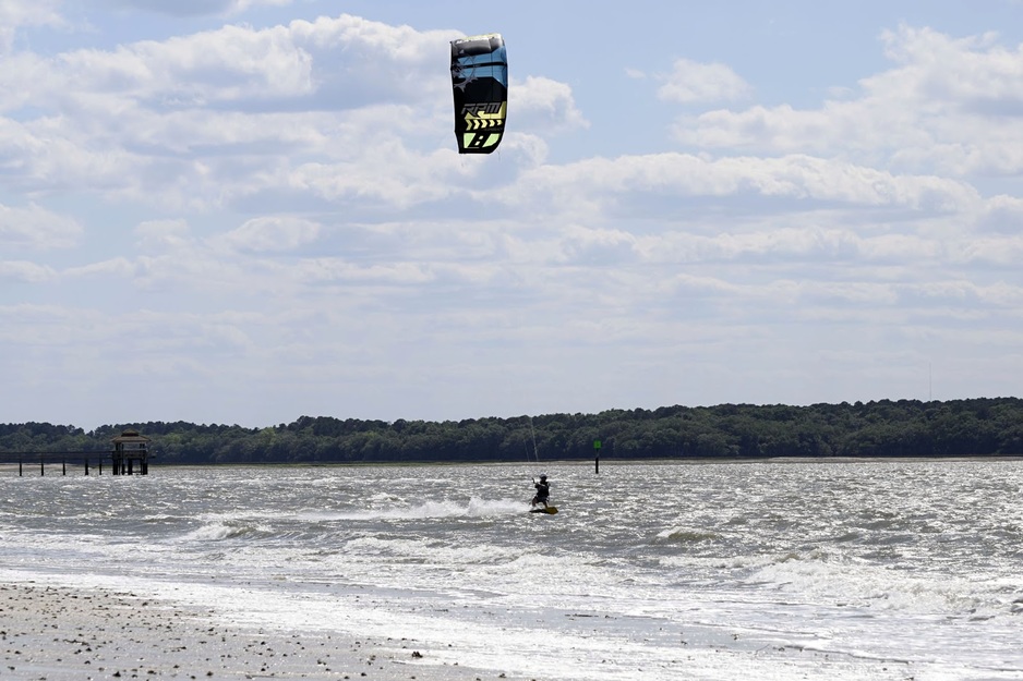 Kitesurfer out in the sea