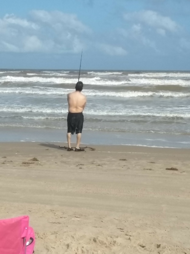 Fisherman on the beach