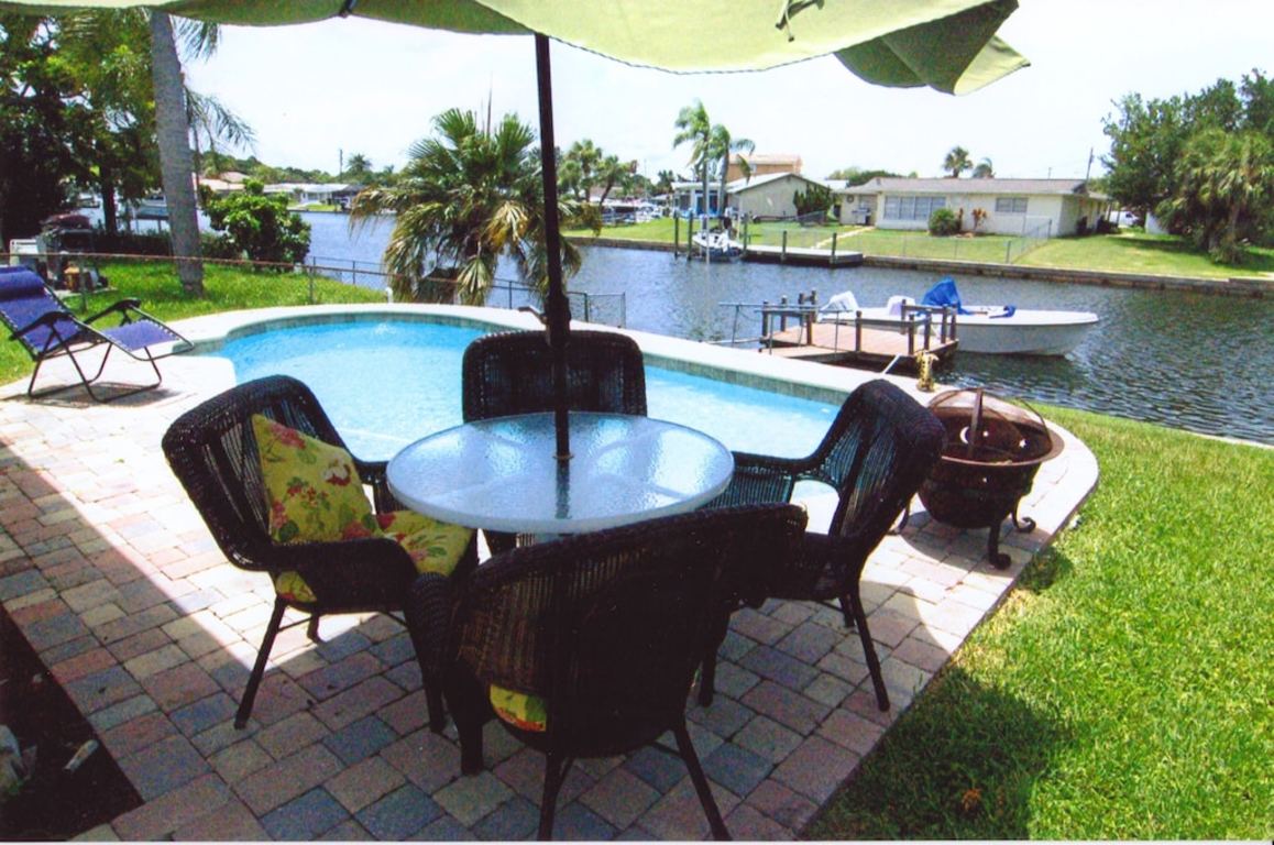 Quaint Waterfront Home with Heated Pool • Just 5 Minutes From the Beach photo