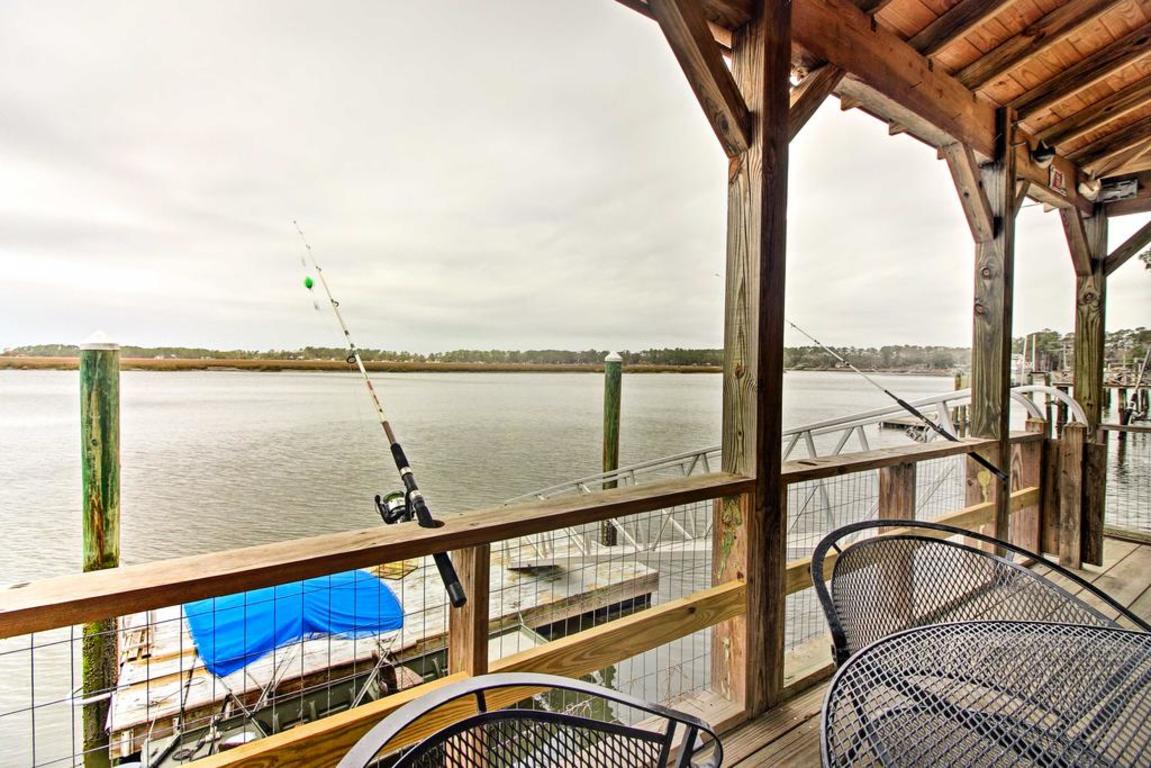 Waterfront Midway Home with Private Dock and Grill! photo