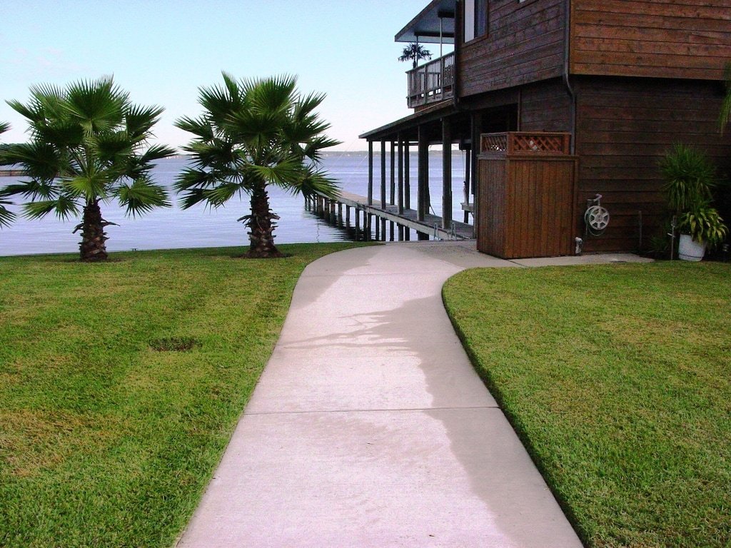 Lakefront Home - Private Fishing Pier - walk to stores & restaurants photo