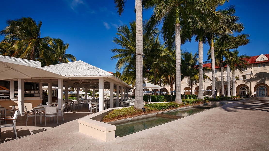 Palms and beach pavilion