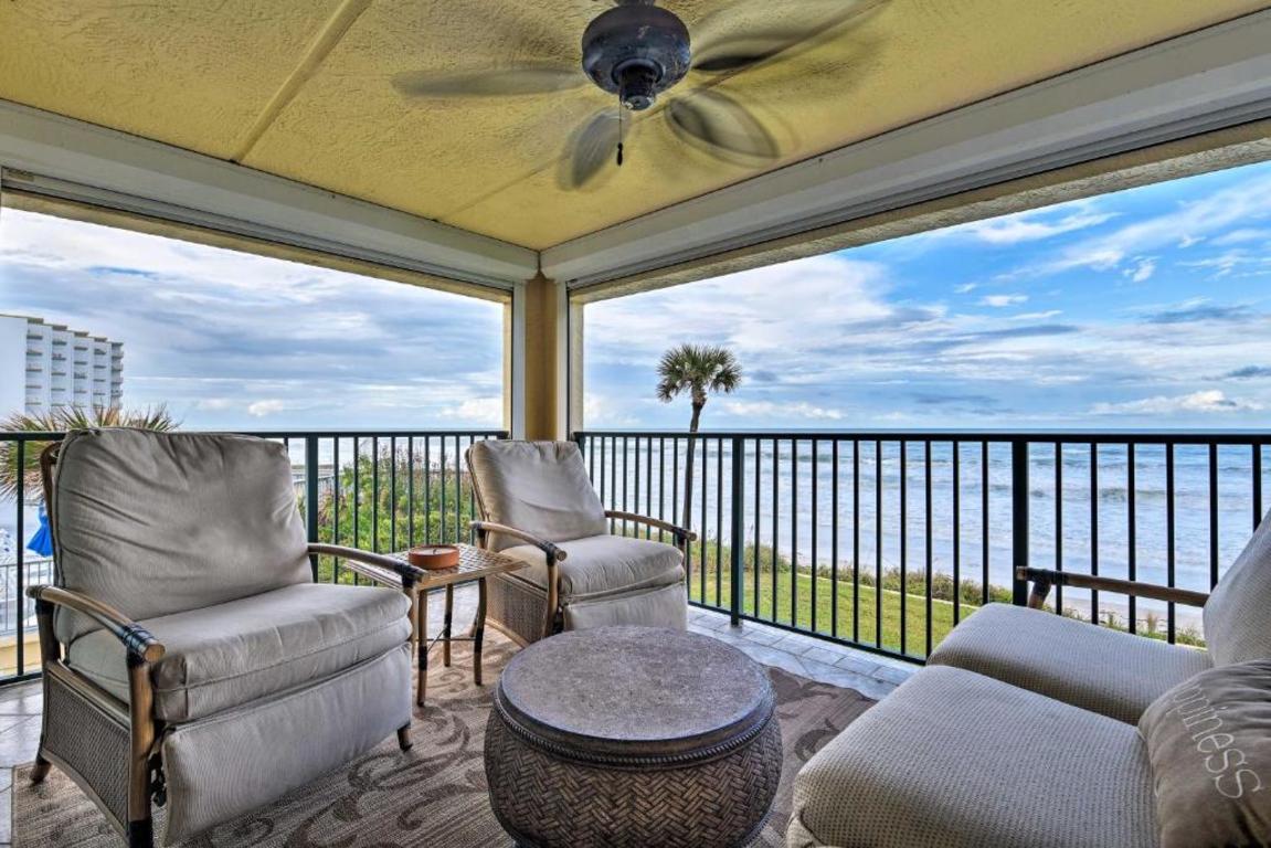 Lavish Beachfront Condo with Balcony and Pool Access photo