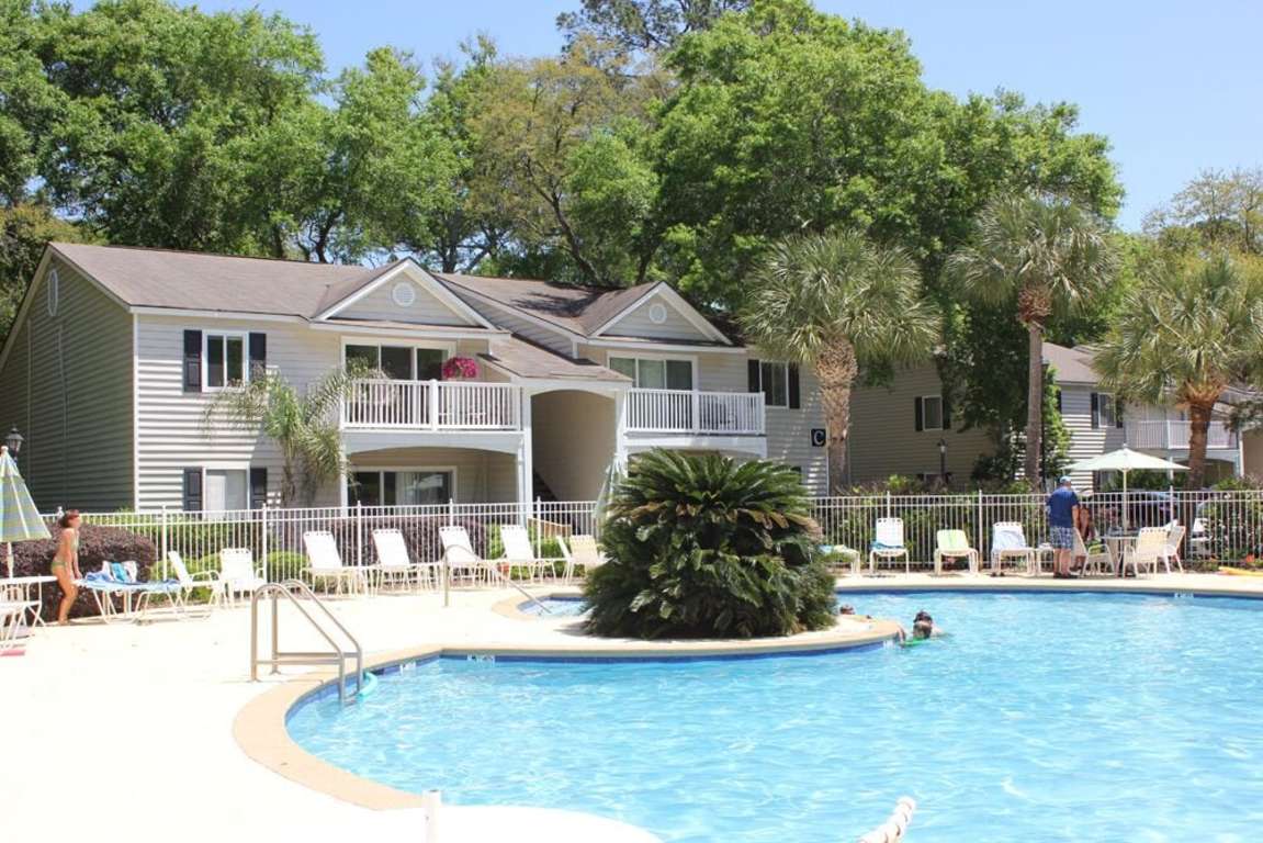 1BR Ground Floor Condo with Screened-in Porch! Steps away from Pool! photo