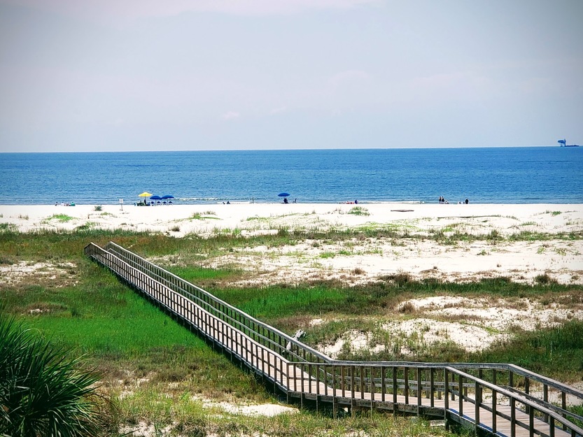 Wooden boardwalk on Dauphin Island Public Beach
