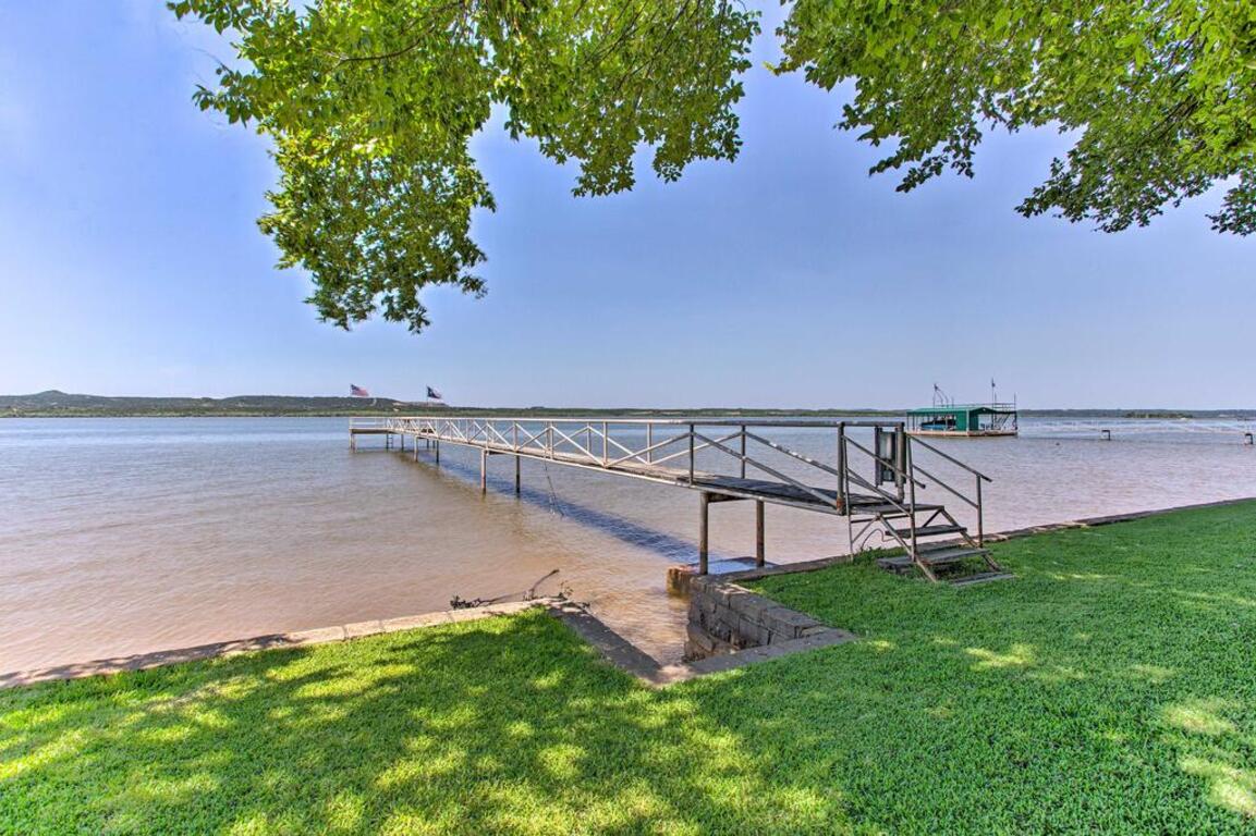 Lakefront Retreat with Private Dock and Bar Hut! photo