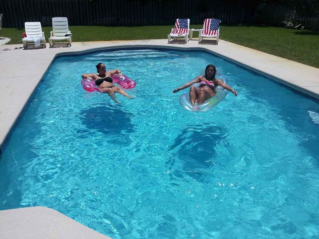 Pool at the house and beach across the street! photo