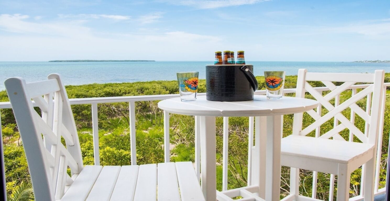 Oceanfront Key Largo Paradise ~ Private Beach~Pool~Tennis~Kayaks~Free WiFi photo