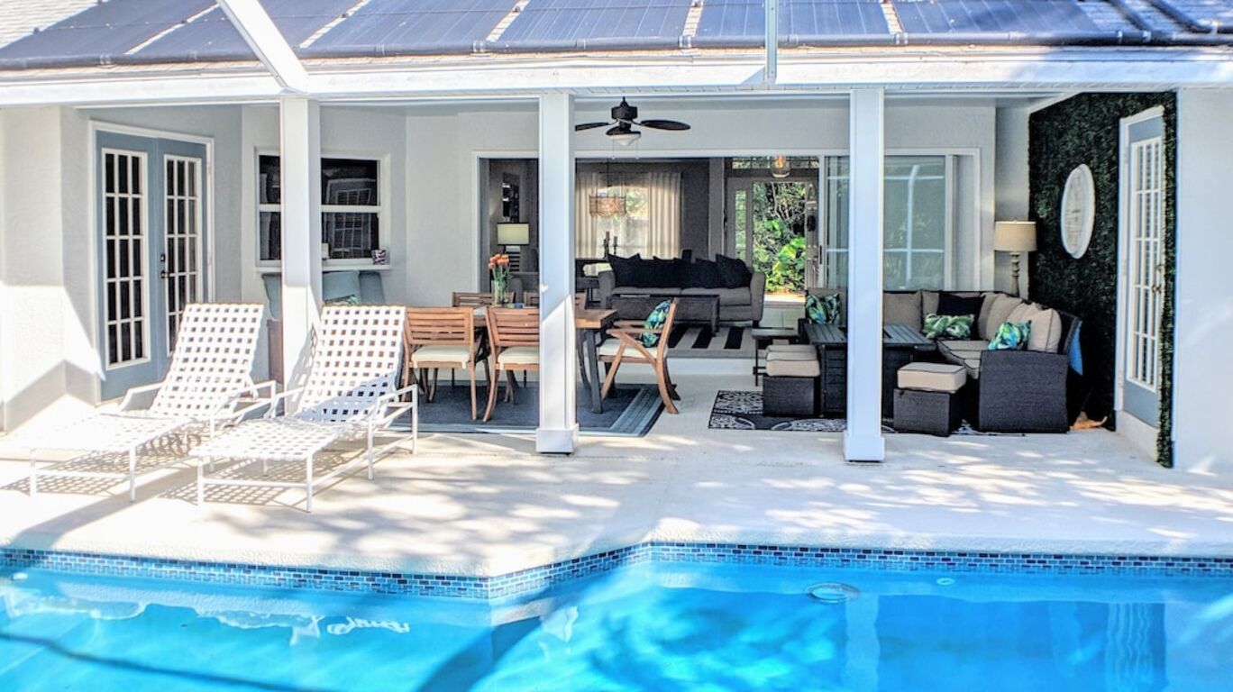 East of A1A Pool Home Steps to Beach! Heated Pool, Hot Tub, Bikes, and Kayaks photo