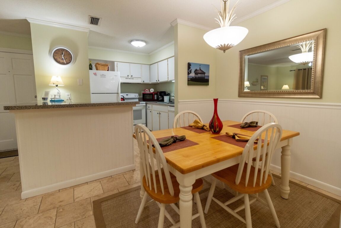 1BR Ground Floor Condo with Screened-in Porch! Steps away from Pool! photo