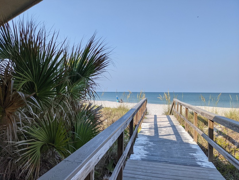 Wooden boardwalk on Don Pedro Island State Park Beach