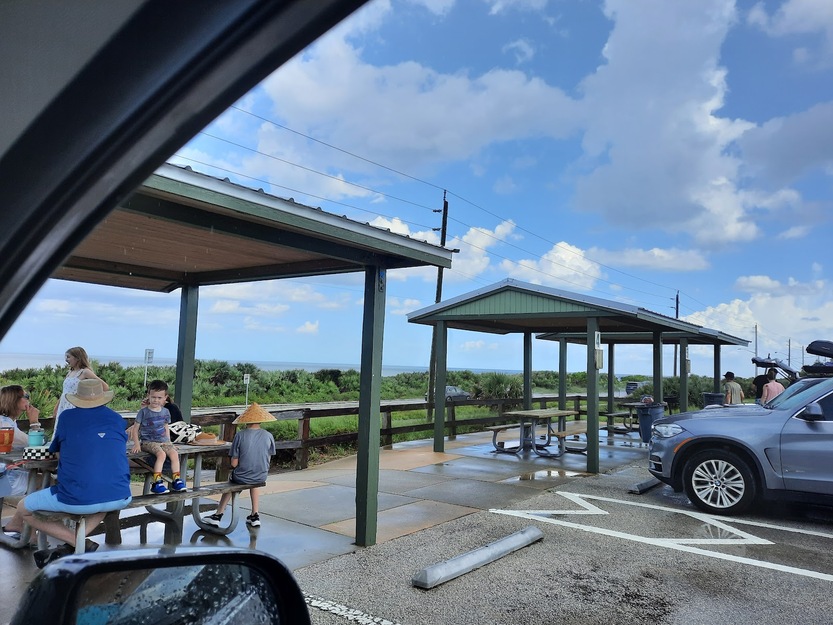 Covered picnic tables in Michael Crotty Bicentennial Park FL